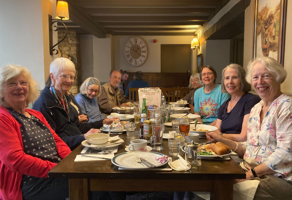 Still Green group members enjoying a meal together at a recent social gathering